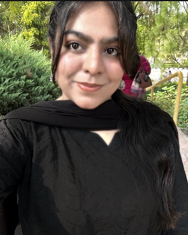 Aleeha outdoors in a garden